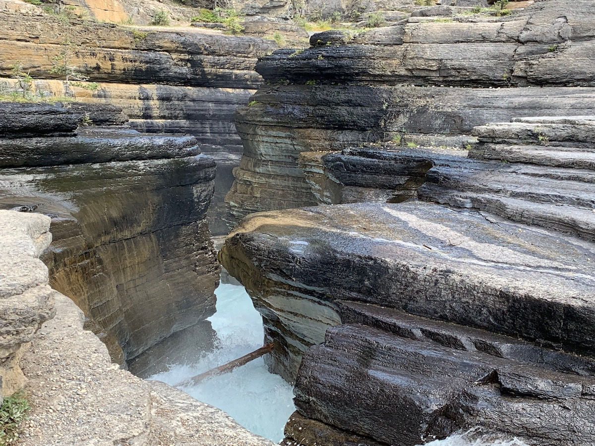 Mistaya Canyon river running through the rocks