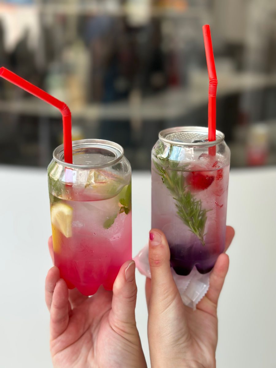 Colorful fruit and tea drinks with red straws