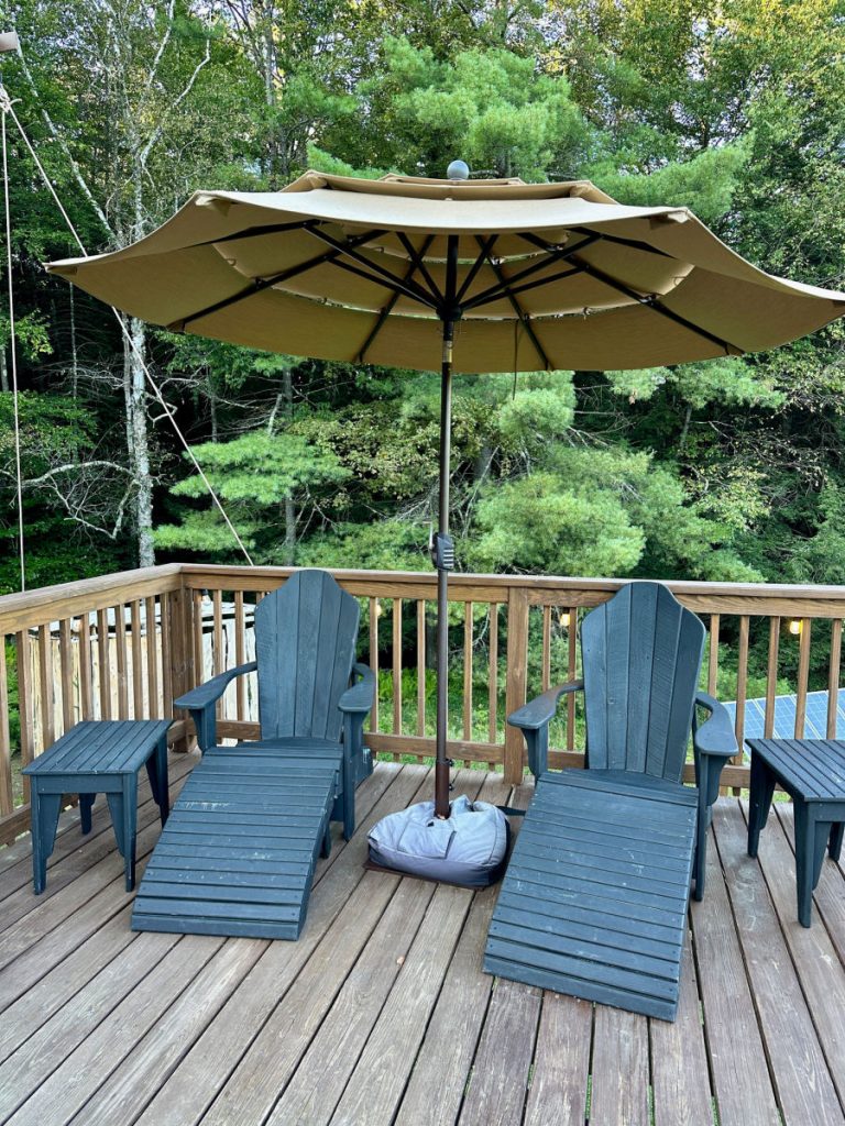 Lounge chairs on porch of Highwood Retreat