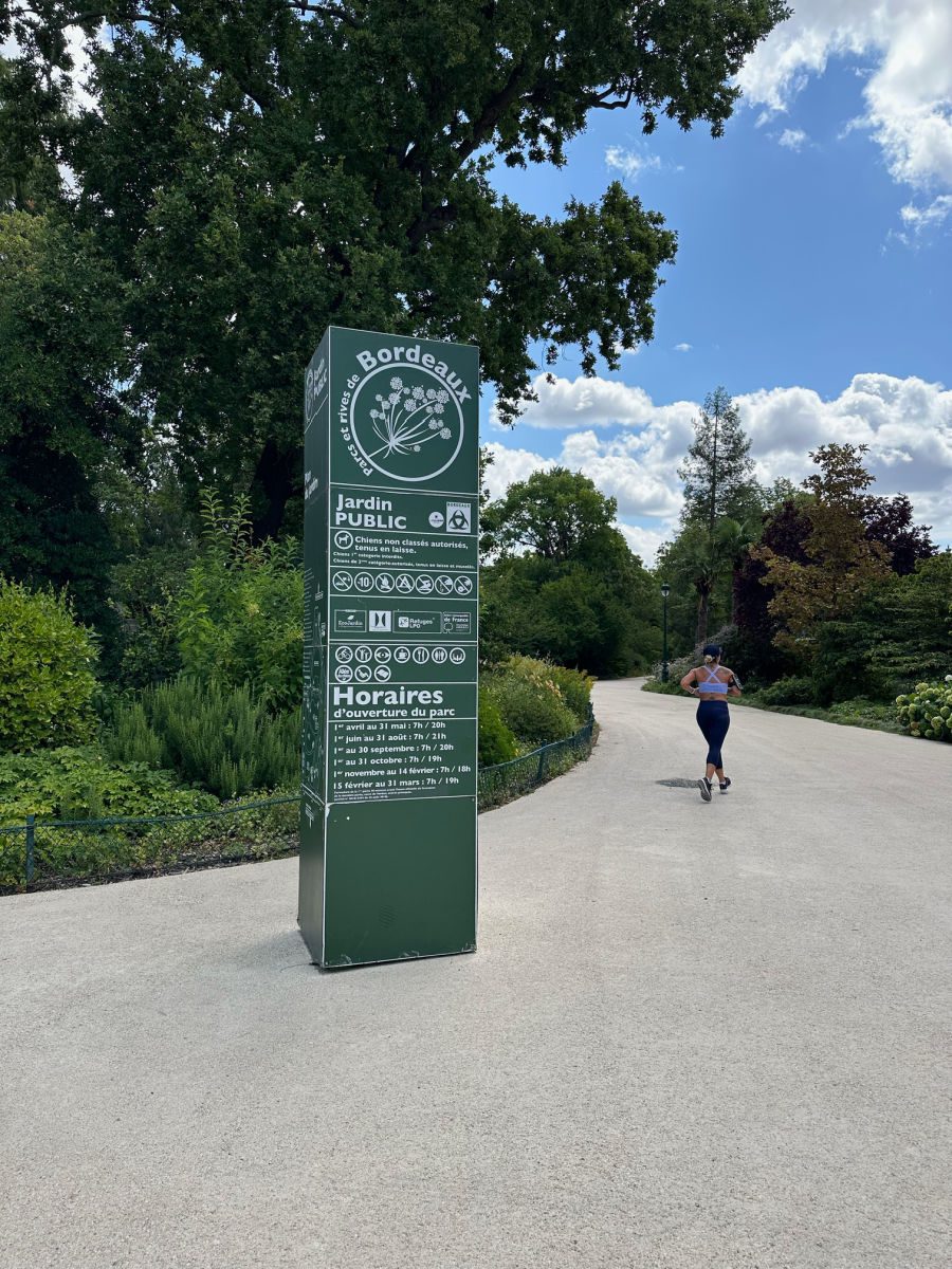 Bordeaux public garden entrance with jogger