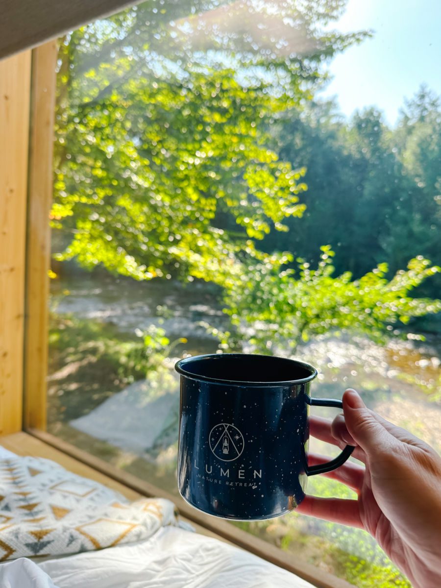 Lumen mug in front of window