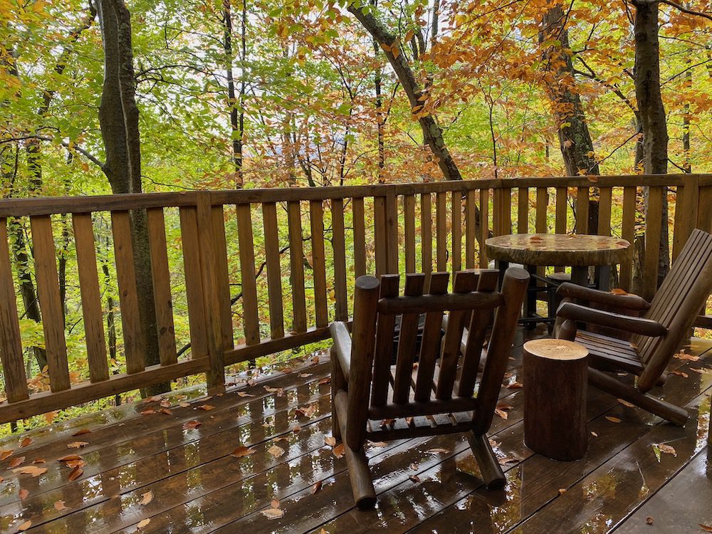 Chairs on a treehouse deck