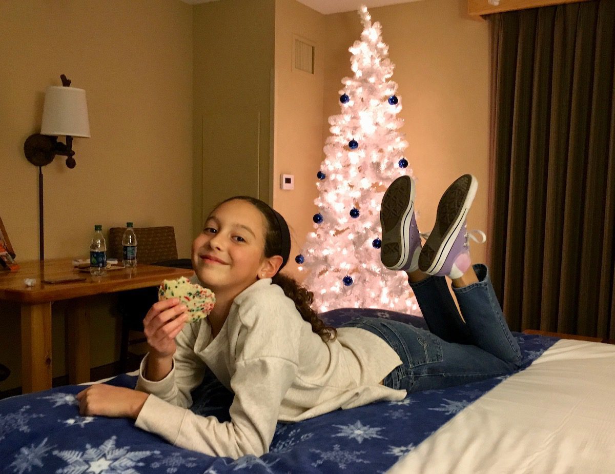Hannah on bed in Snowland Suite at the Great Wolf Lodge