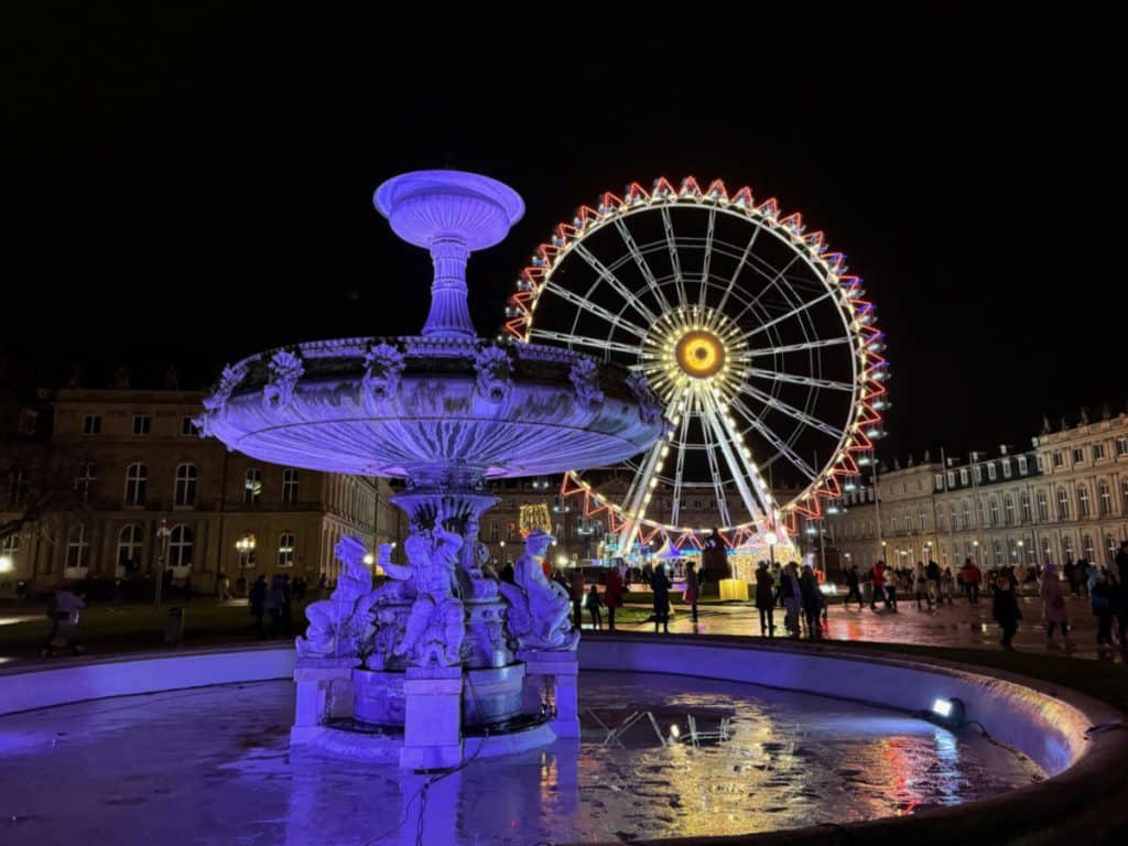 Stuttgart Christmas Markets - Ferris wheel and fountain in Schlossplatz