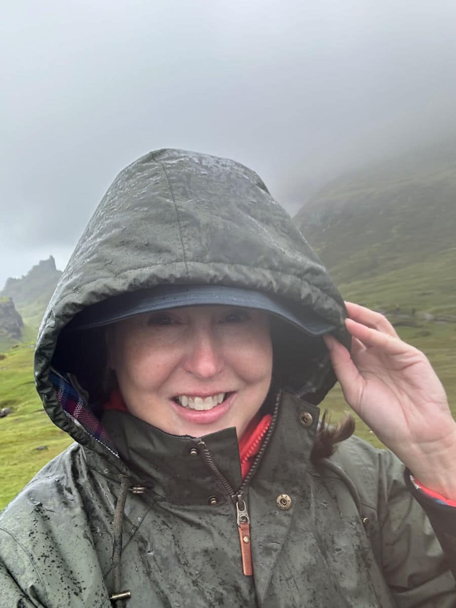 Tamara selfie in coat and hat in the rain
