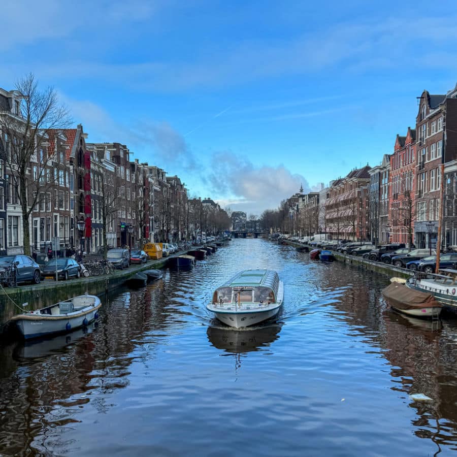 Boat in canal in Amsterdam - 3 days in Amsterdam itinerary