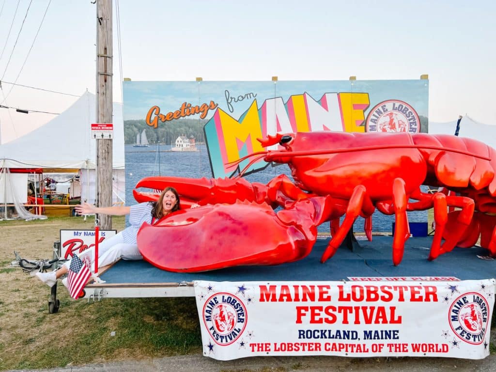 Tamara with giant lobster at Maine Lobster Festival