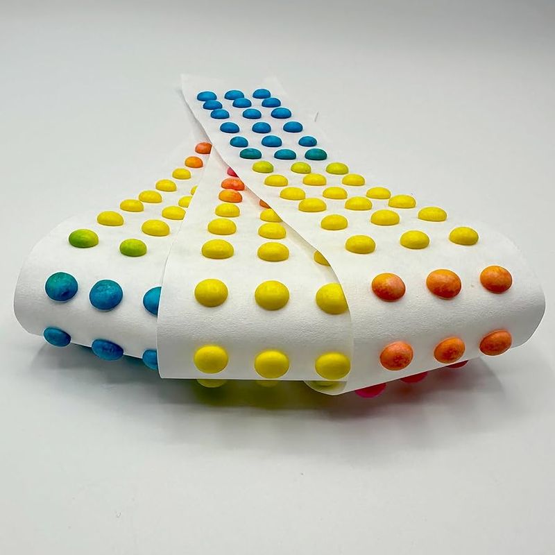 Candy Buttons - The Paper-Eating Experience