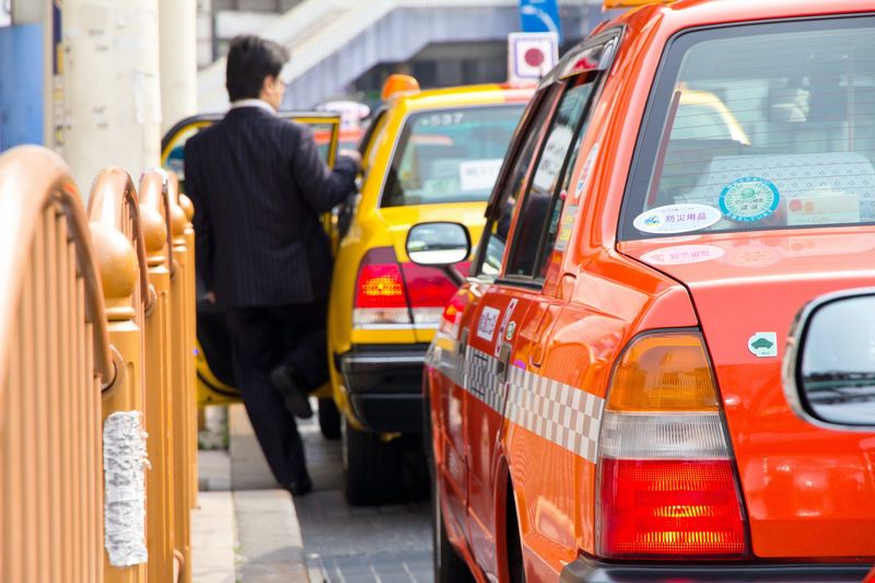 Taxis Have Automatic Doors (Don't Touch Them!)