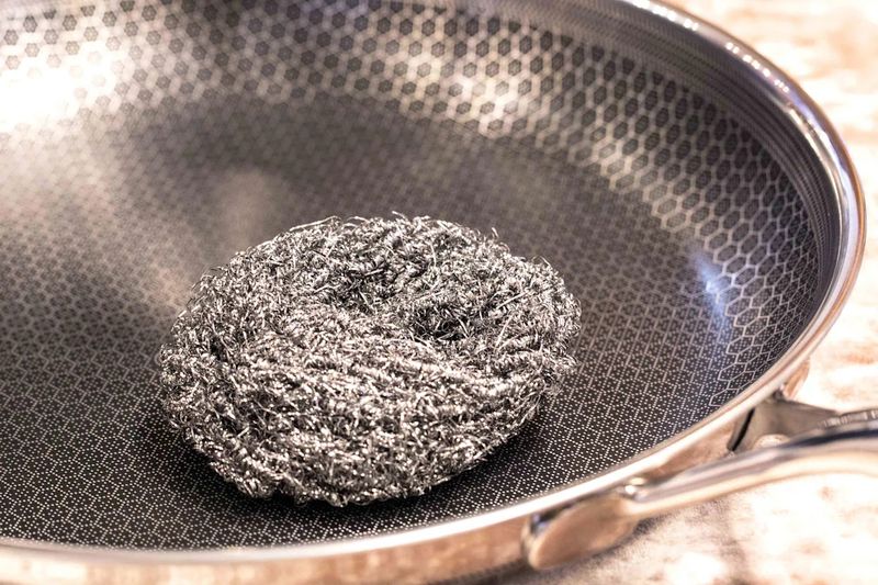 Scrubbing the Fryers by Hand