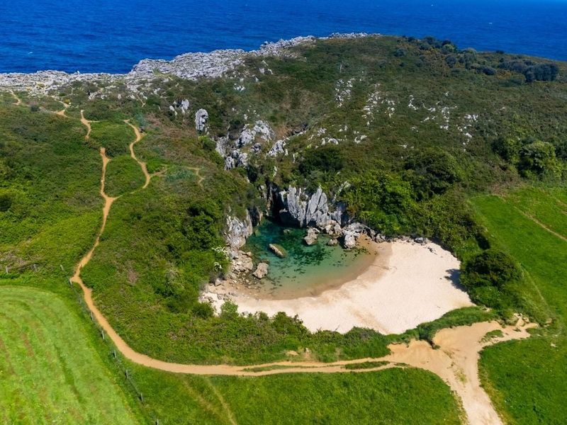 Playa de Gulpiyuri, Spain