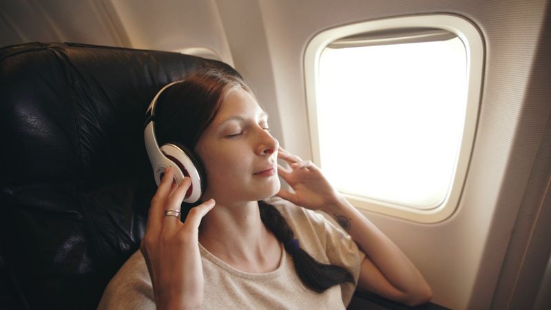 Noise-Cancelling Headphones (Plus Earplugs as Backup)