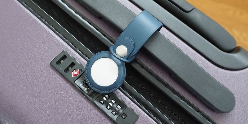 Bluetooth luggage tracker (e.g., AirTag, Tile, Pebblebee)