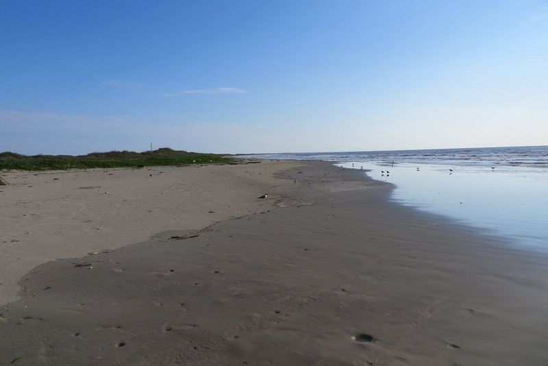 Discover 21 Miles of Untouched Golden Shoreline
