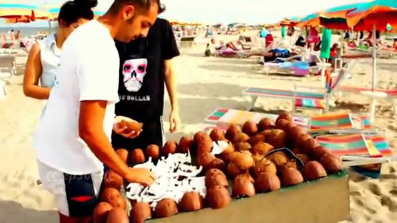 Coconut Vendors with Machetes