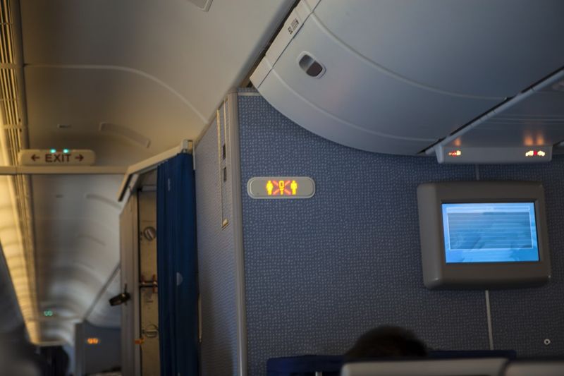 The Seat Right Next to the Bathroom