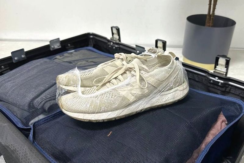Use Shower Caps to Protect and Organize Shoes