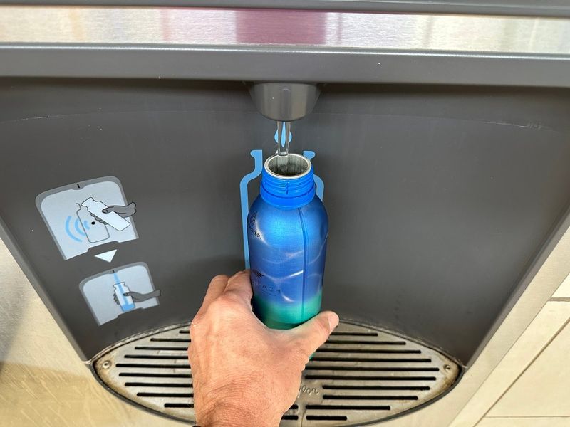Bring an empty bottle and refill after security