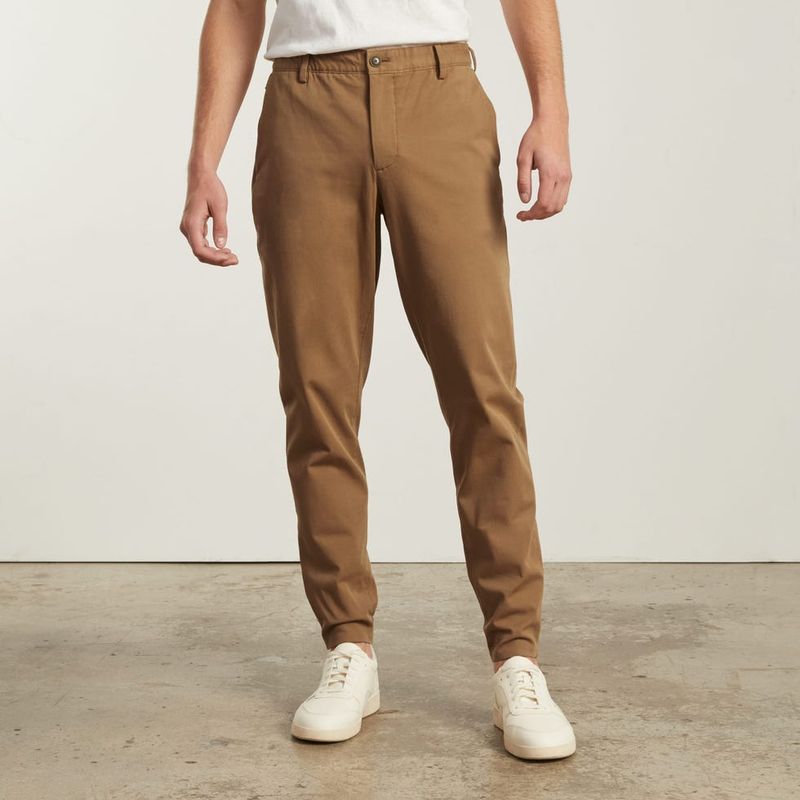 Heavy denim → Stretchy travel pants (nylon/spandex)