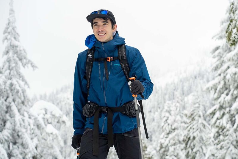 Lightweight Waterproof Shell (e.g., Patagonia Triolet or Arc’teryx Alpha SV)