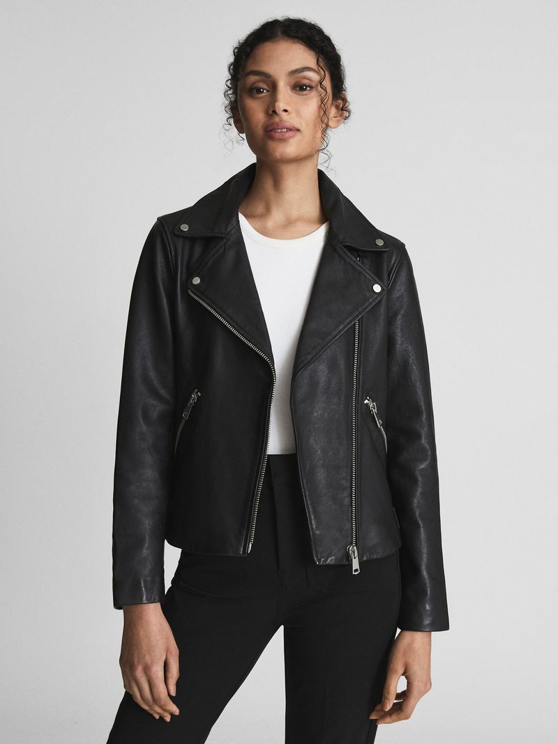 Leather or faux-leather jacket (moto or minimalist)