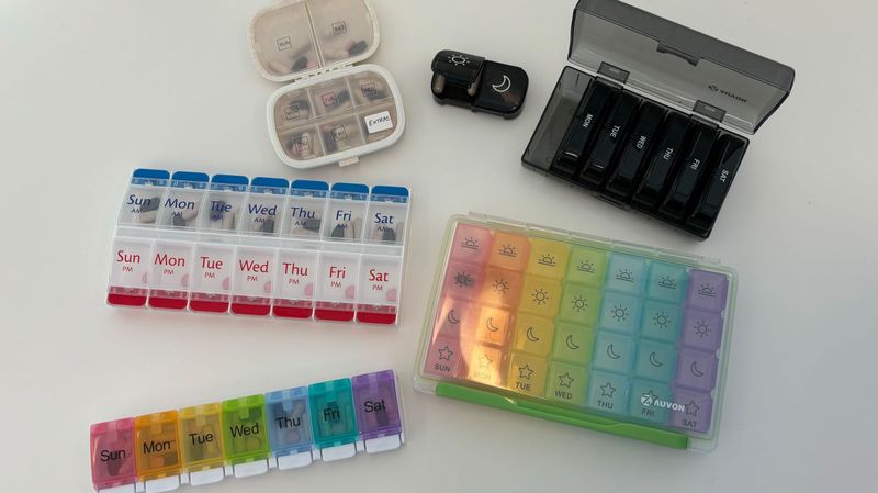 7-Day Pill Organizer (ideally with alarms) + original meds in carry-on