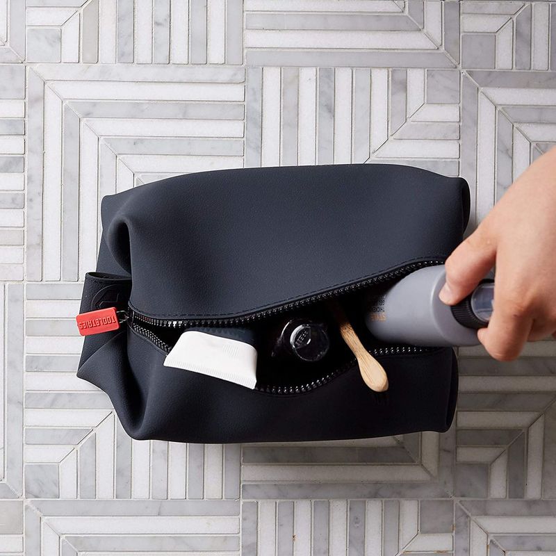 Dopp kit with leakproof travel bottles