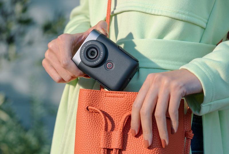 Canon PowerShot V10 (ultra-compact vlogging camera) — ~211 g (with battery/card)