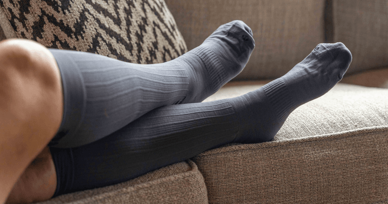 Wear compression socks on long flights (if you're at risk)