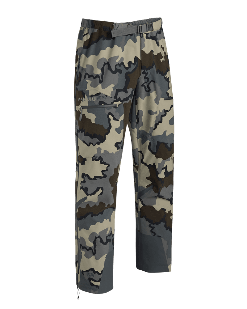 A waterproof/windproof outer shell (jacket; pants if needed)