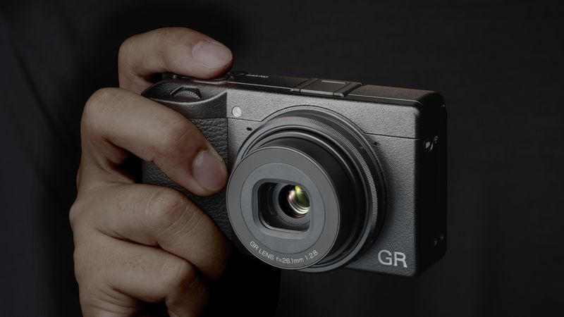 Ricoh GR IIIx – Ultra-compact with excellent detail and responsiveness, beloved for street photography.