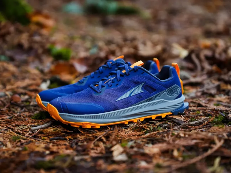 Altra Lone Peak 9 – Athletic travel shoe with a naturally wide toe box and great traction, ideal if you mix urban walking with light trails