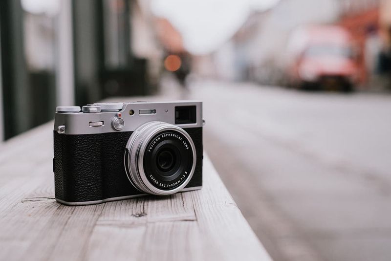 Fujifilm X100V – Fixed 23 mm lens with APS-C sensor; retro design hides modern power.