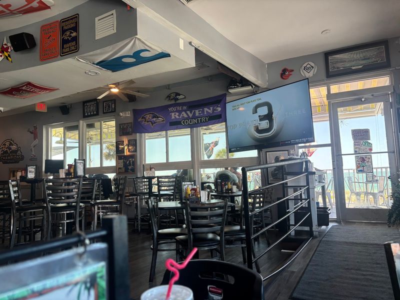 A Beach Sports Bar With Wall-to-Wall TVs A Beach Sports Bar With Wall-to-Wall TVs