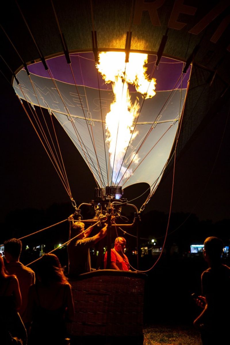 A balloon glow creates a ground-based spectacle A balloon glow creates a ground-based spectacle