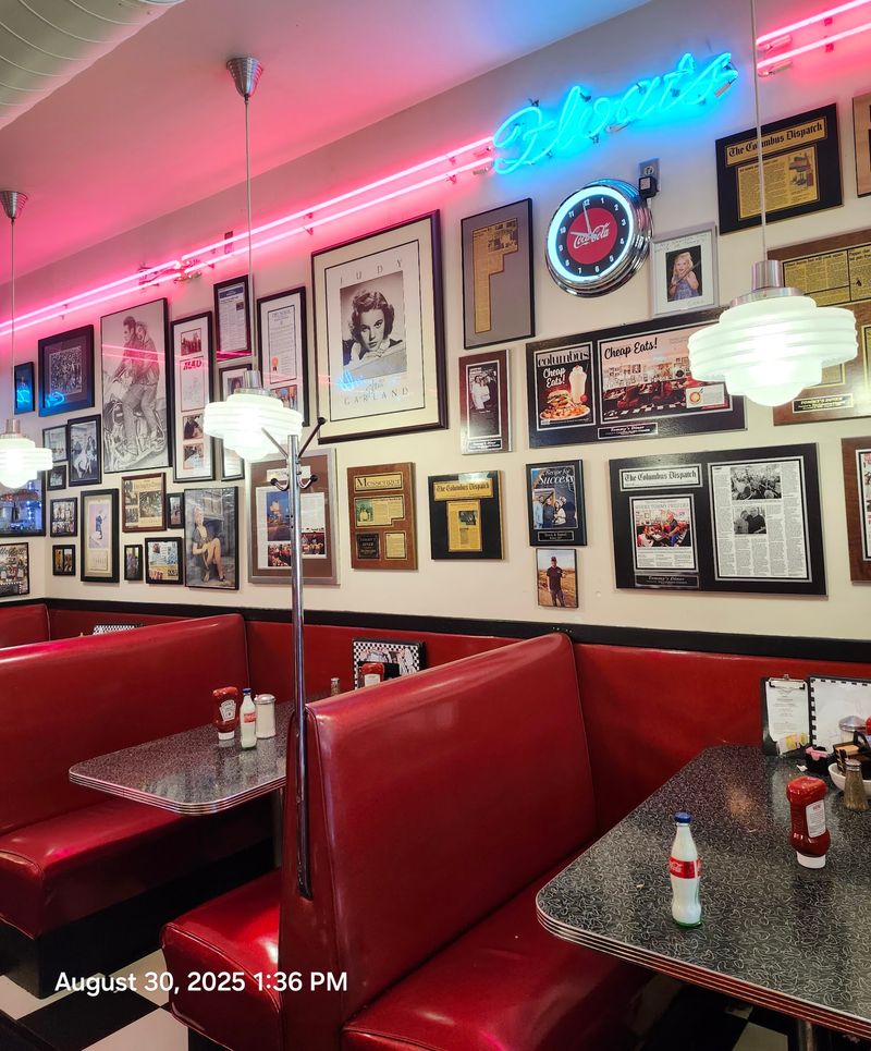 Booths, Neon, And A Wall Of Memories Booths, Neon, And A Wall Of Memories