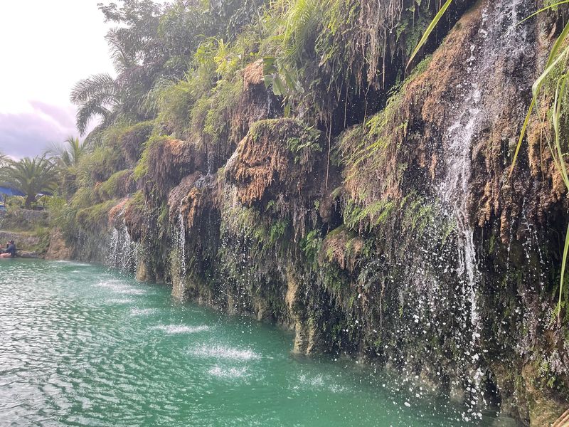 Cascading Rock Walls and Spring-Fed Water Cascading Rock Walls and Spring-Fed Water