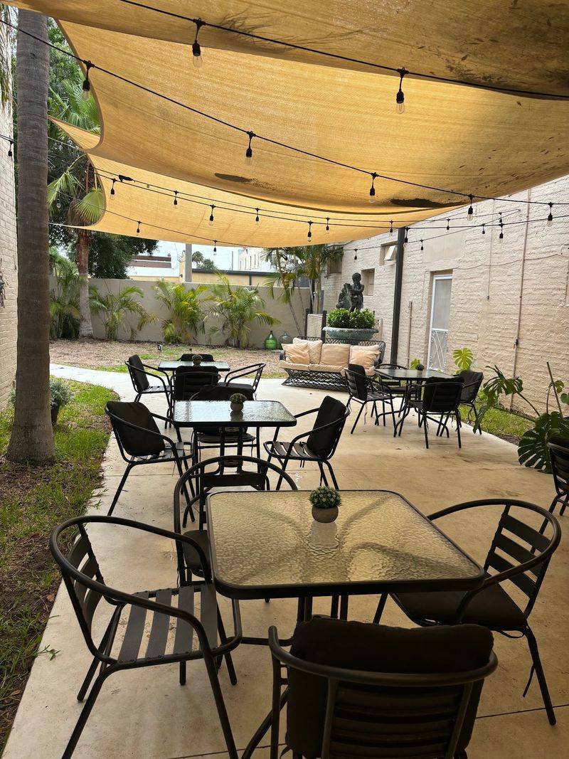 Seating Inside and the Courtyard Out Back Seating Inside and the Courtyard Out Back