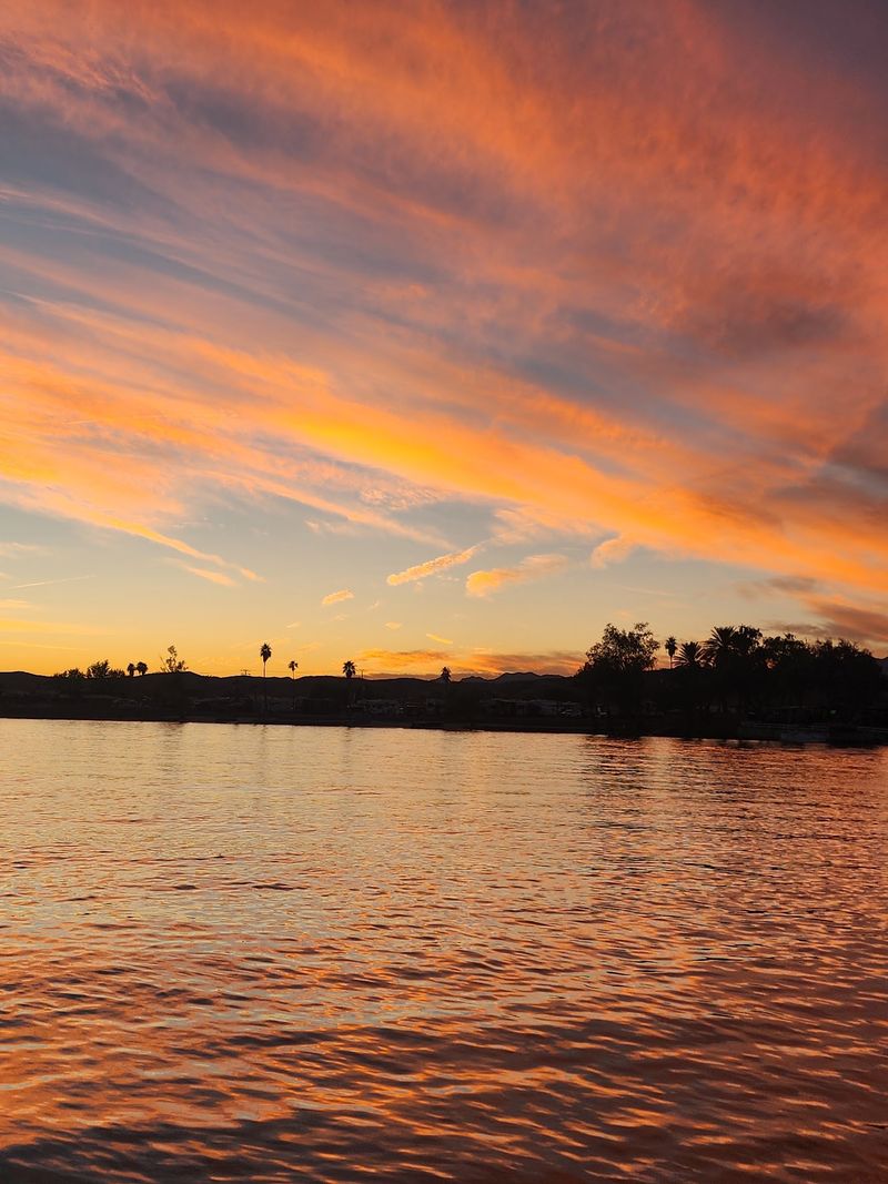 Sunsets Over The Water