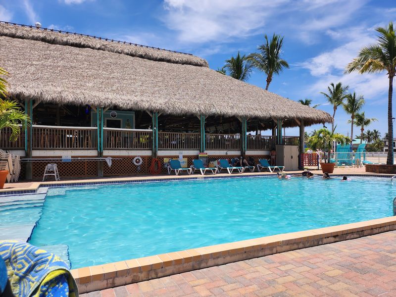 Two Seating Worlds: Inside and Poolside