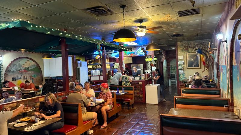 Booths, Beer Signs, and a Throwback Feeling Booths, Beer Signs, and a Throwback Feeling