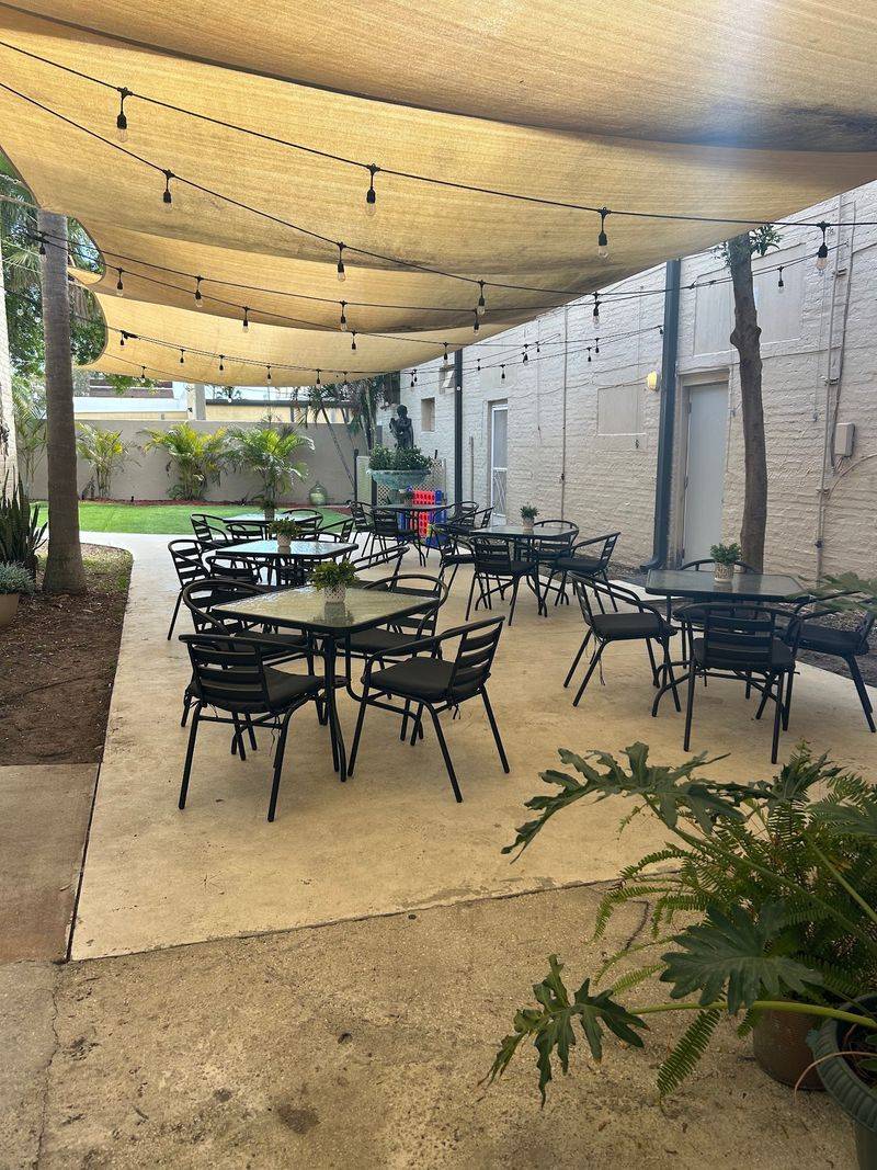 The Covered Patio and Backyard Play Area The Covered Patio and Backyard Play Area