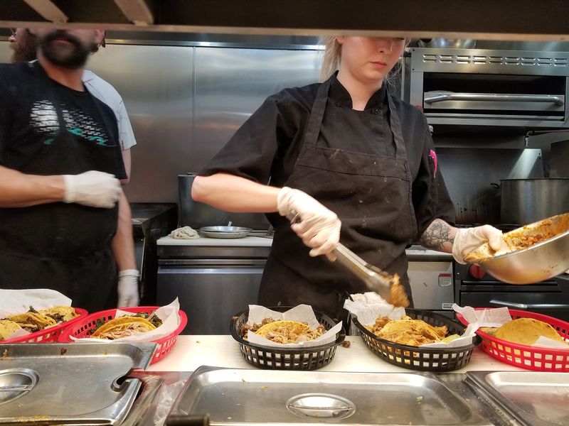 A Crew That Keeps the Counter Humming A Crew That Keeps the Counter Humming