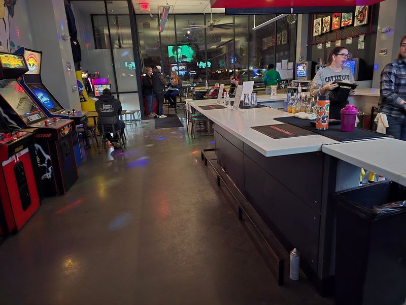 A Square Bar Ringed By Glowing Cabinets
