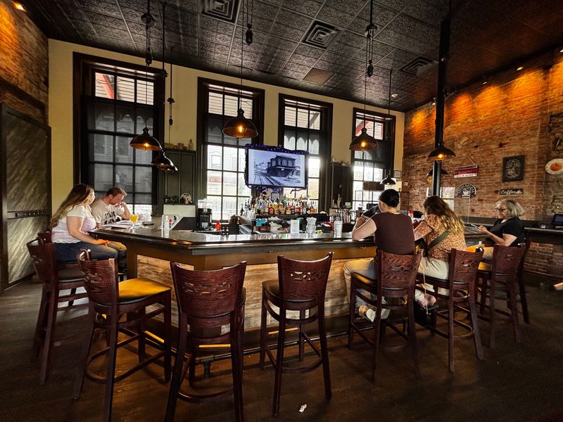 Exposed Brick and a Busy Bar Counter Exposed Brick and a Busy Bar Counter