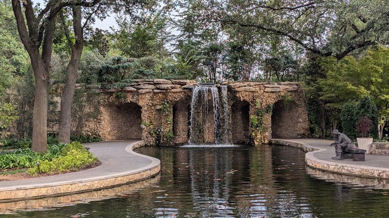 Koi Ponds, Waterfalls, And Sculptures