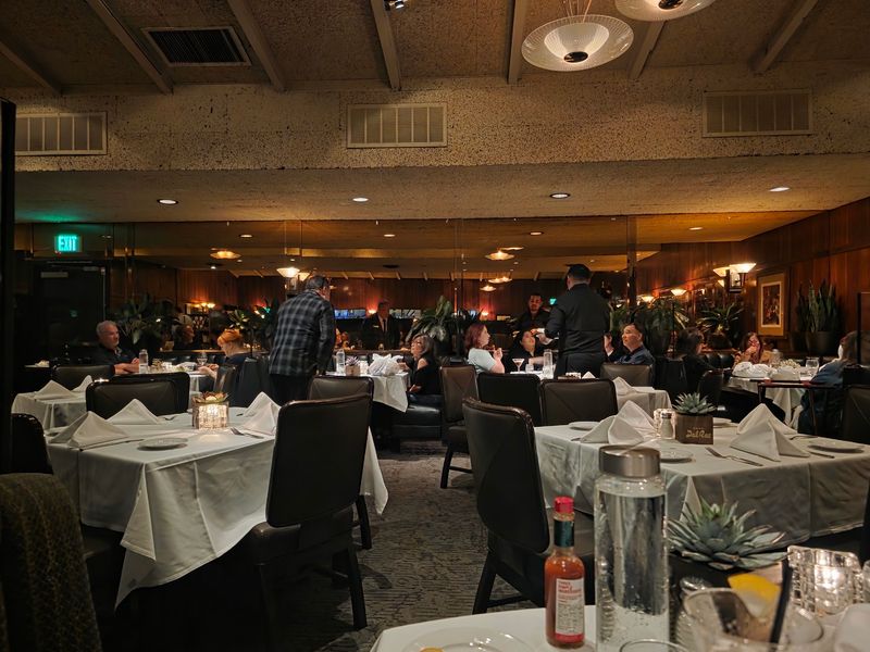 Live Music and Suit-Wearing Servers Live Music and Suit-Wearing Servers