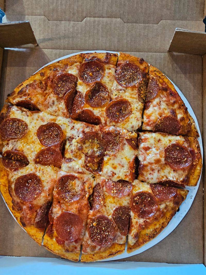 Pizza, Stromboli, and Pasta in the Background
