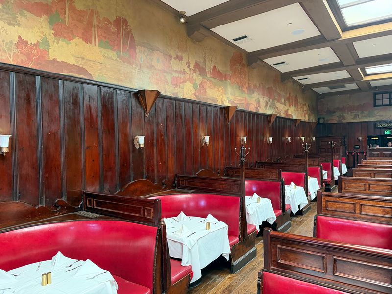Red Booths and Wood-Paneled Walls