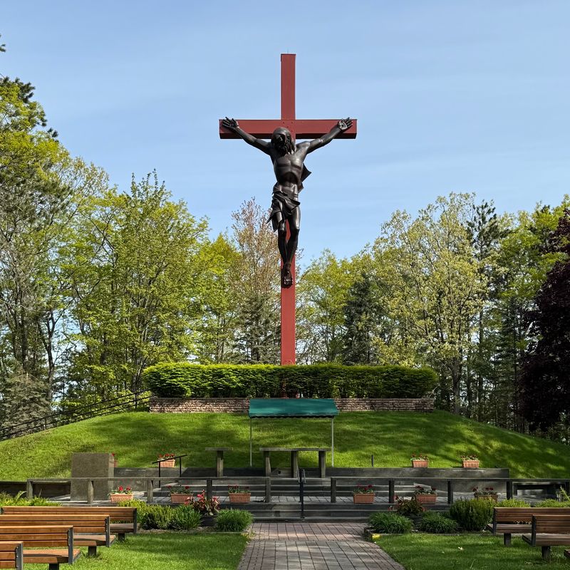 The Crucifix Behind the Church The Crucifix Behind the Church